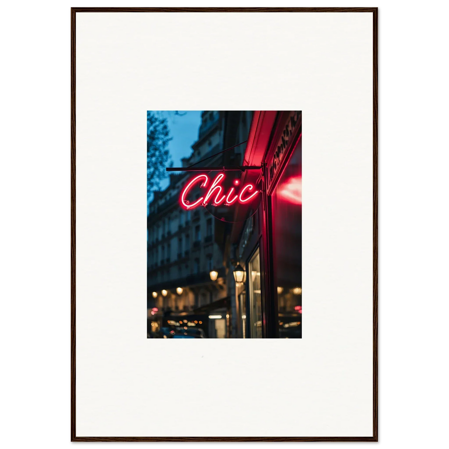 Framed photo of a neon Chic sign, part of Neon Urban Whispers display at night