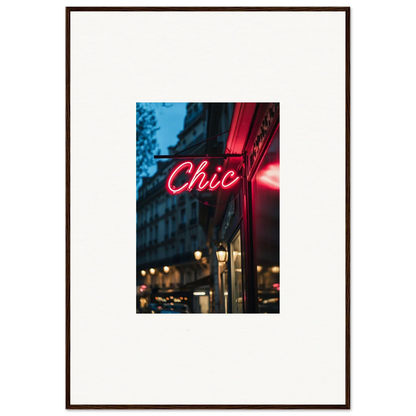 Framed photo of a neon Chic sign, part of Neon Urban Whispers display at night