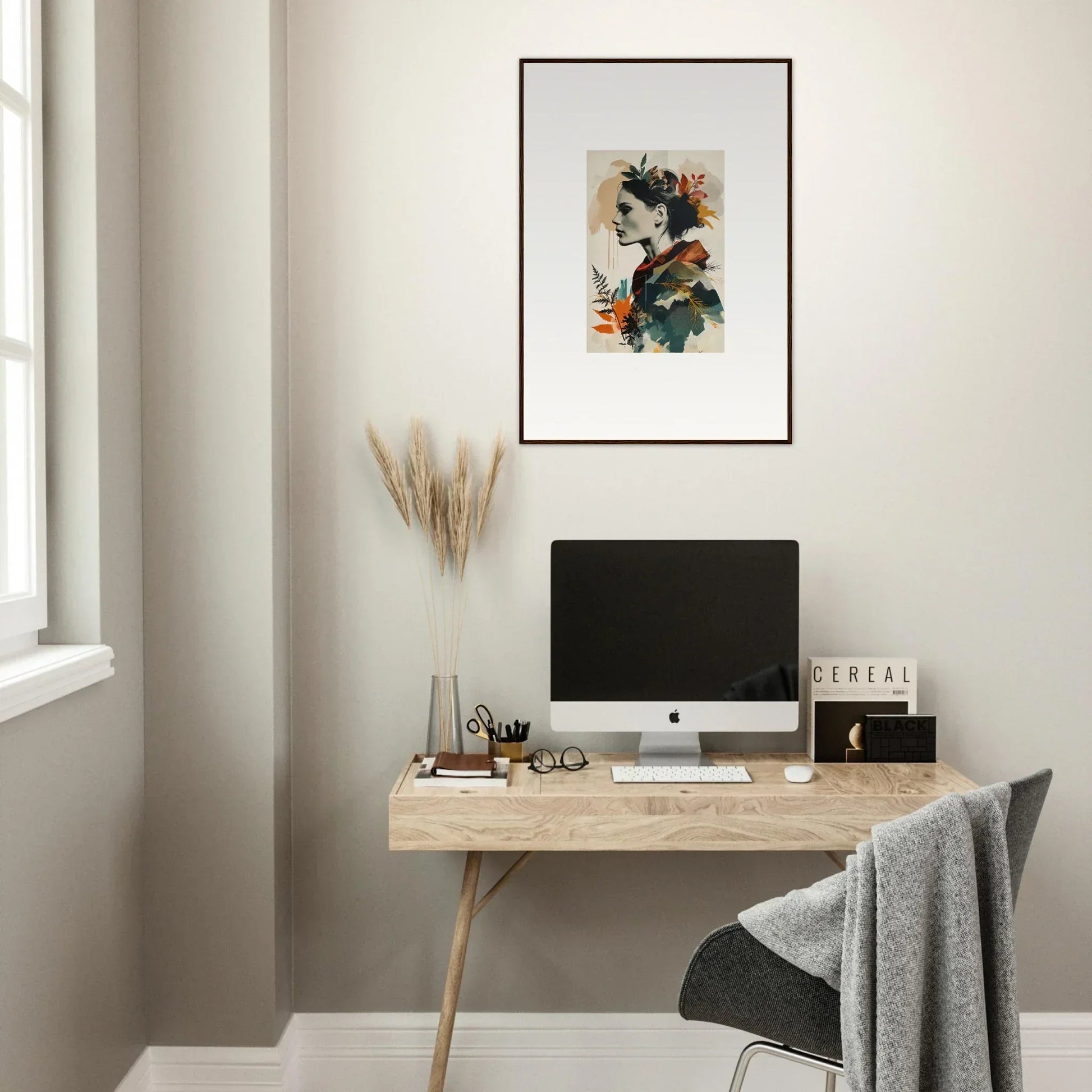 Minimalist home office with wooden desk, computer, and Autumn Waltz framed wall art