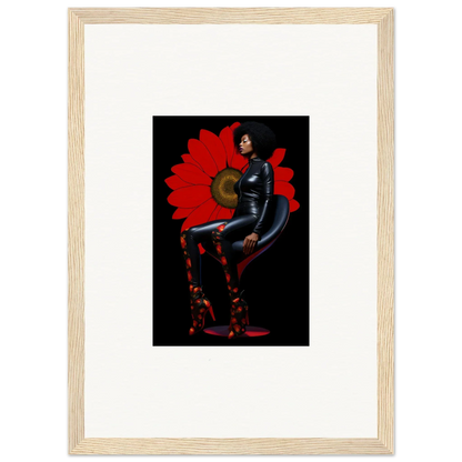 Framed canvas print of a Noir Petal Goddess in black against a bold red background