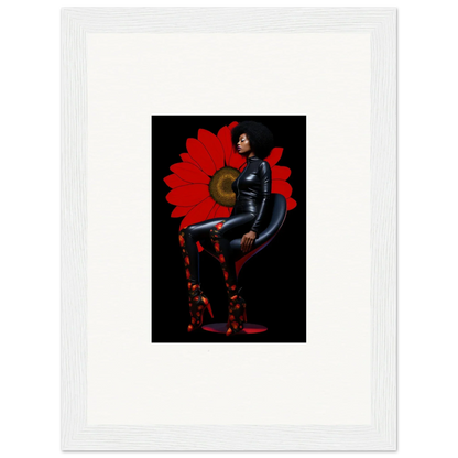 Framed canvas print of Petal Goddess in a black bodysuit on a bold red backdrop