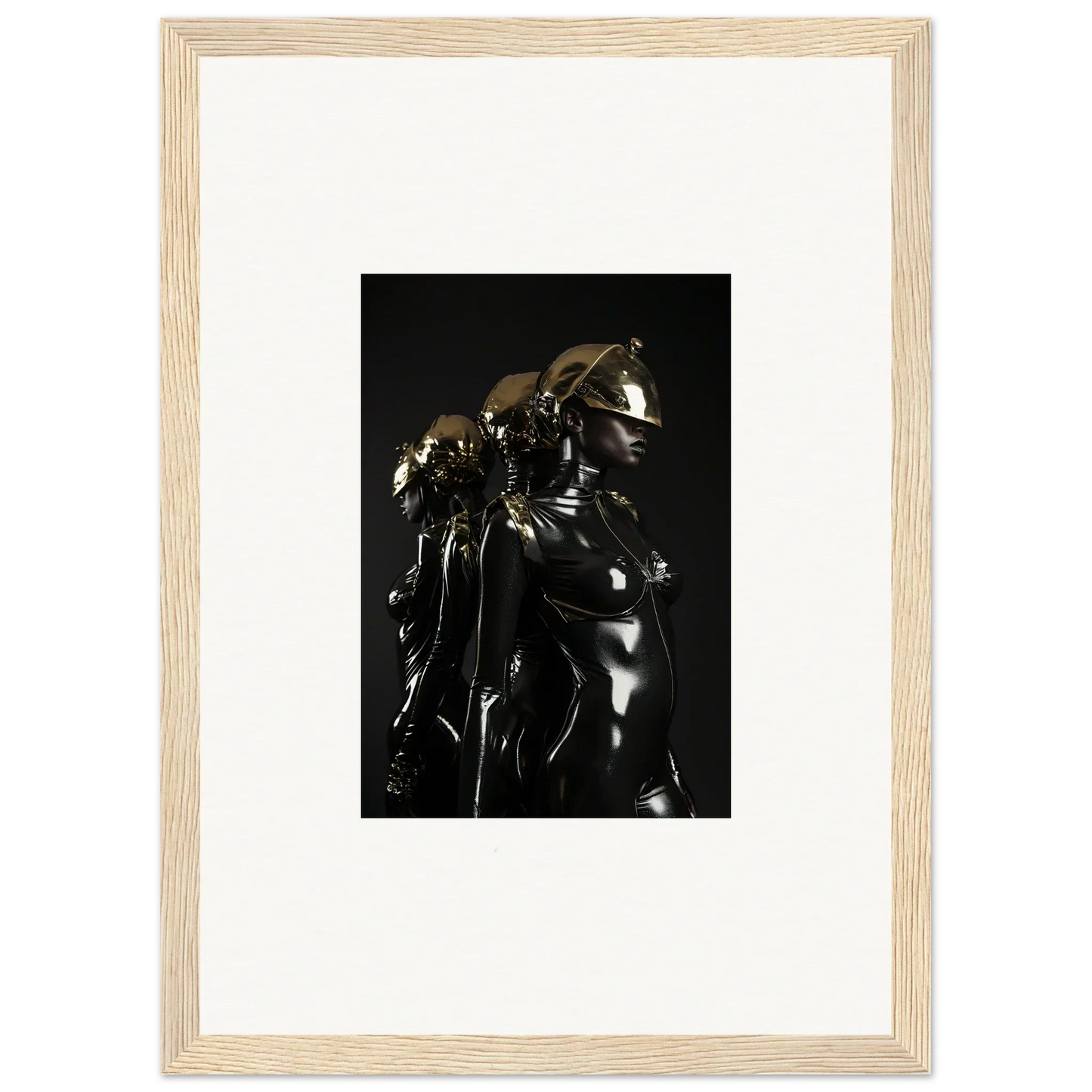 Framed black and white photograph of a metallic-looking sculpture or figure.