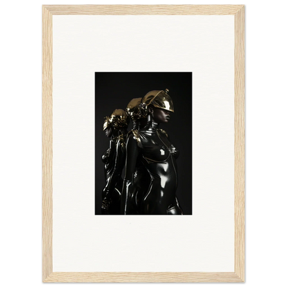 Framed black and white photograph of a metallic-looking sculpture or figure.