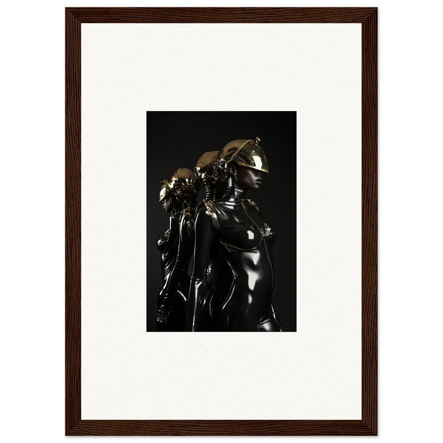 Framed black-and-white photograph of a shiny metallic sculpture or figure.