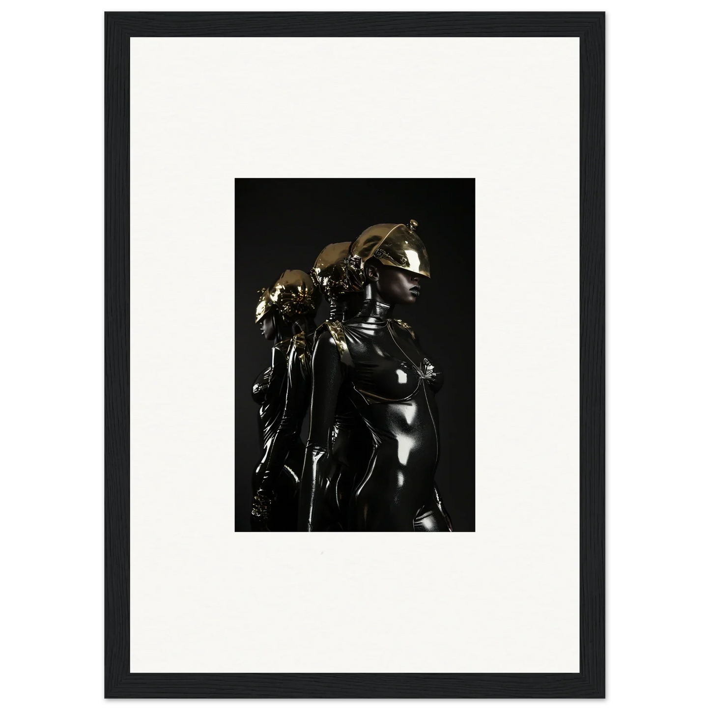 Framed black-and-white photograph of a shiny metallic sculpture or figure.