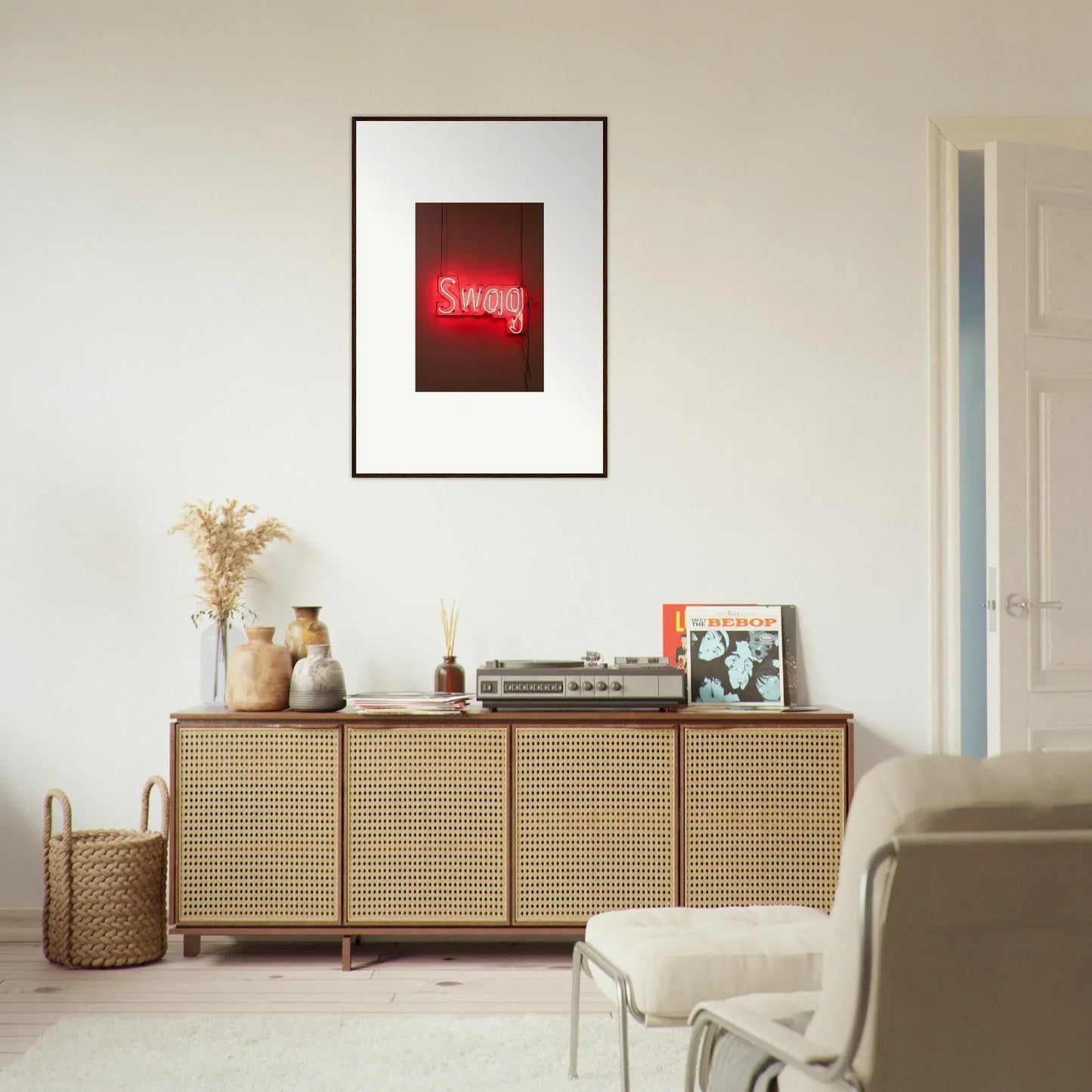 Wooden sideboard with cane-webbed doors and neon Swag sign for stylish room decor