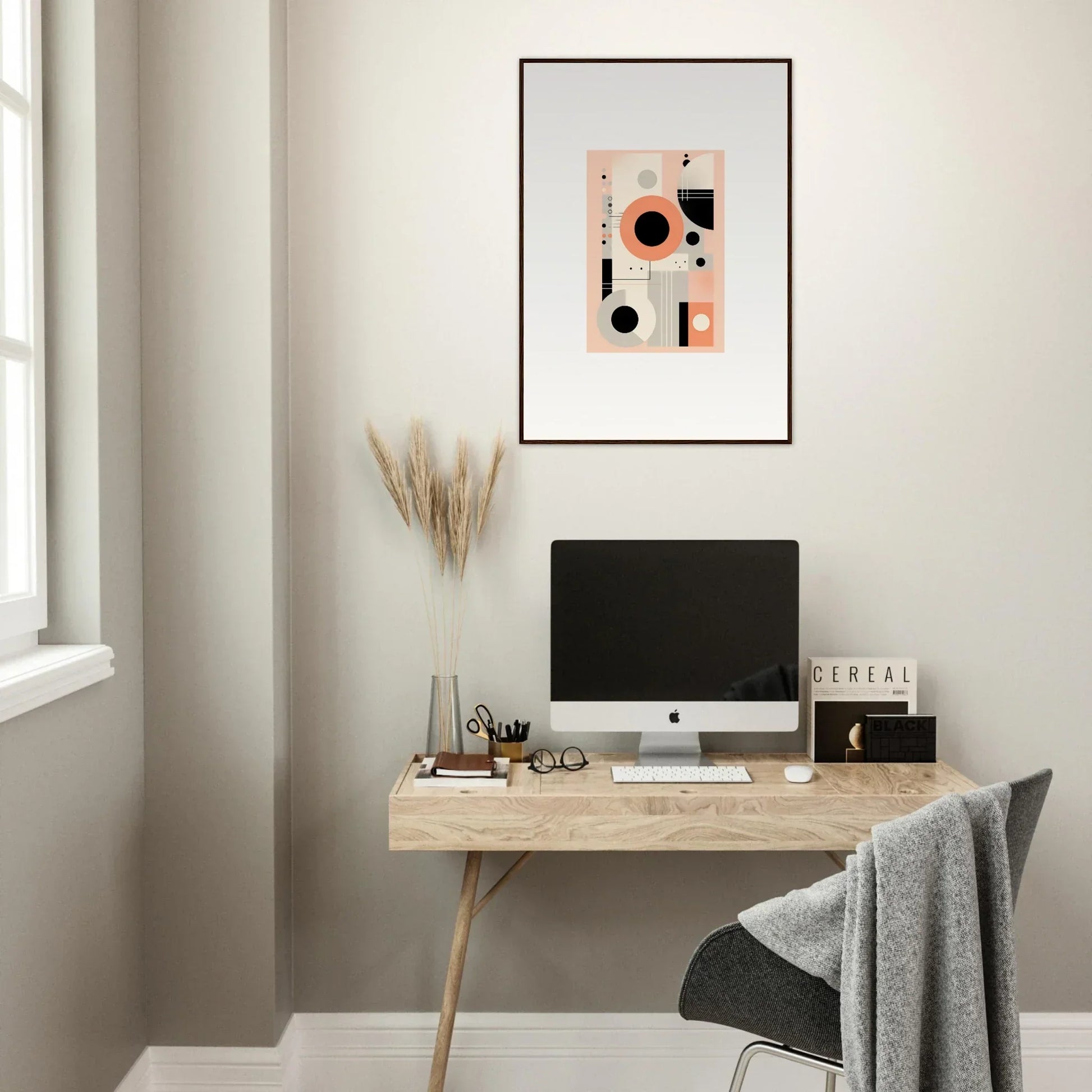 Minimalist wooden desk with iMac and Odyssey Dreamscape Unveiled art above it