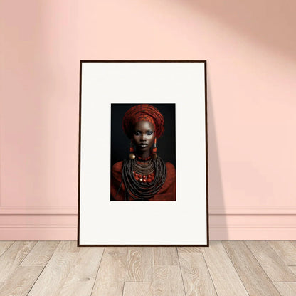 Framed wall art of traditional African attire with red headwrap in Ondine Atrium Accoutrements