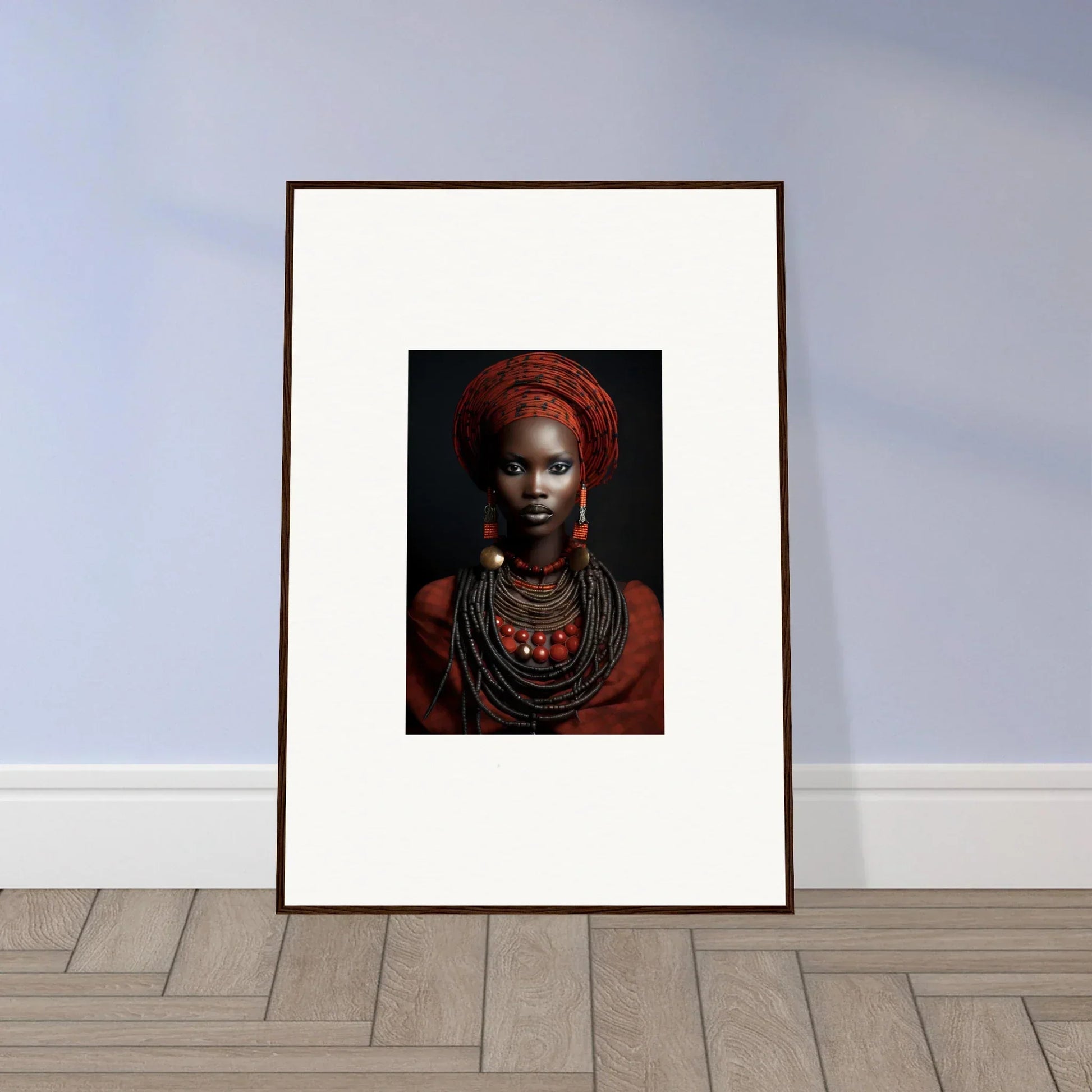 Framed portrait featuring traditional African jewelry and red head wrap from Ondine Atrium Accoutrements