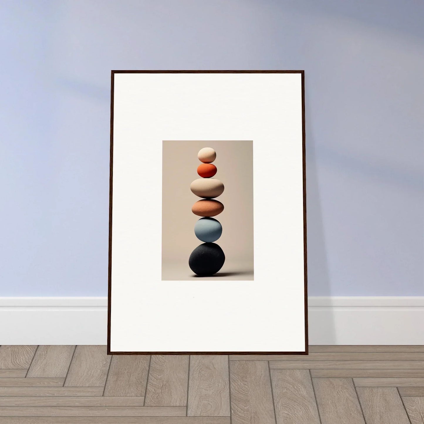 Balanced earth-tone stones stacked in an Orb Reverie premium framed wall art print