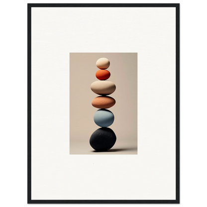 Balanced stack of smooth stones in beige, orange, blue, and black tones for Orb Reverie