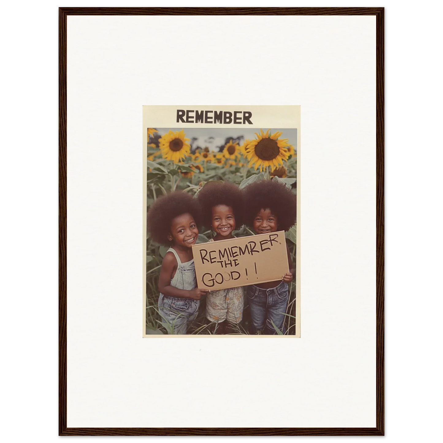 Framed canvas print of kids with afros holding a sign in a sunflower field, solar whimsy vibe