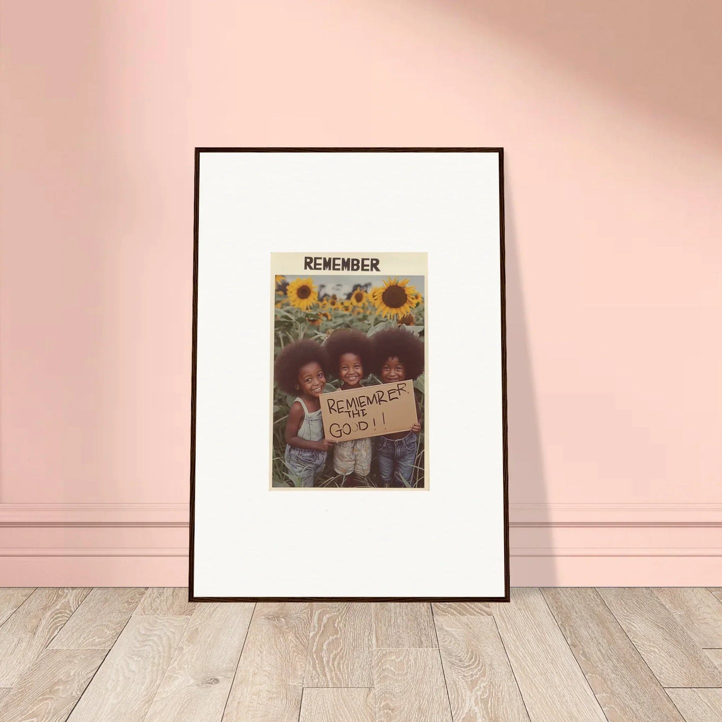 Framed photo of kids with a sign in a sunflower field, perfect for Solar Whimsy room decoration