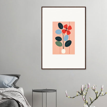 Framed wall art featuring vibrant red flower petals and green leaves, perfect for room decor