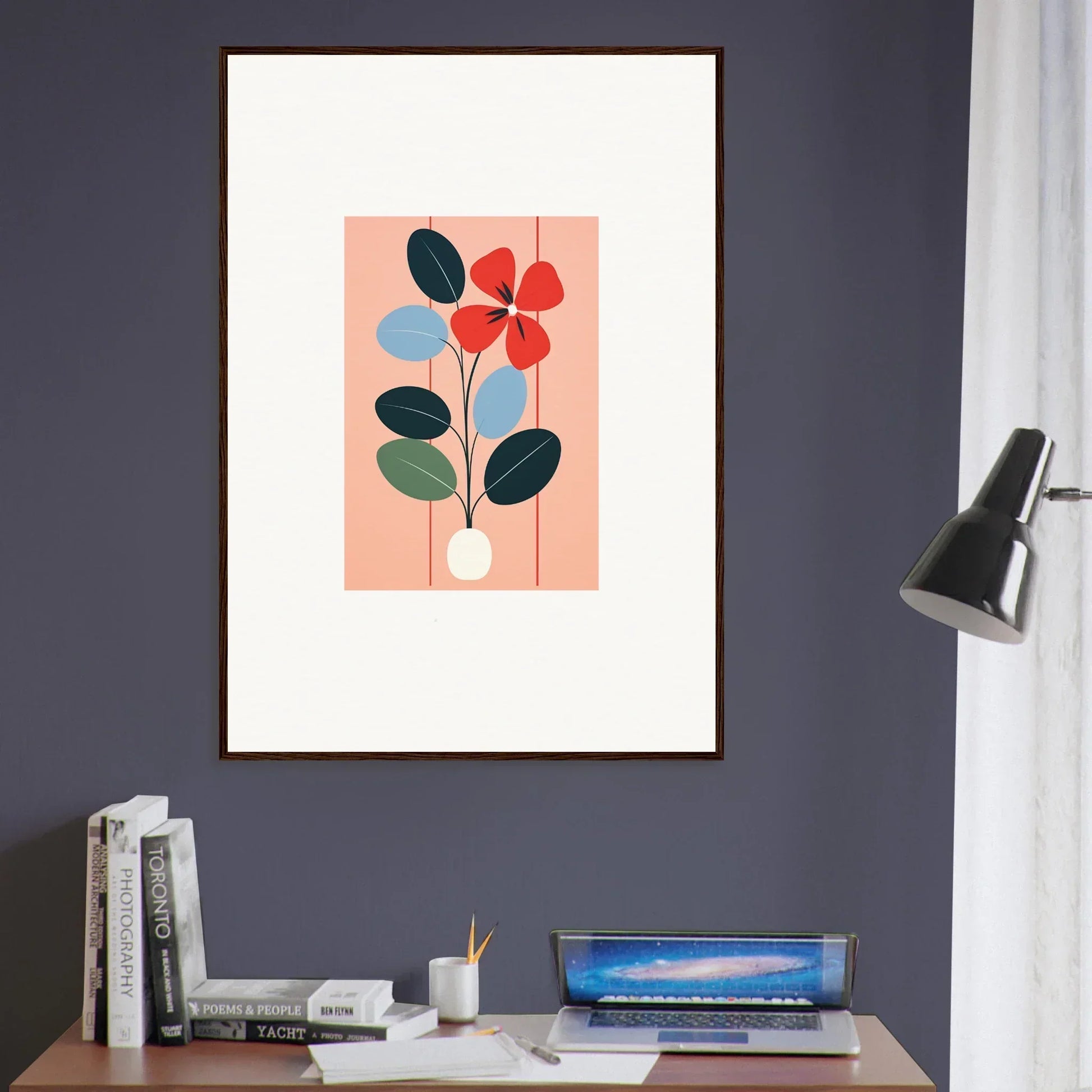 Framed wall art featuring colorful flora imbibed abstract design on pink background