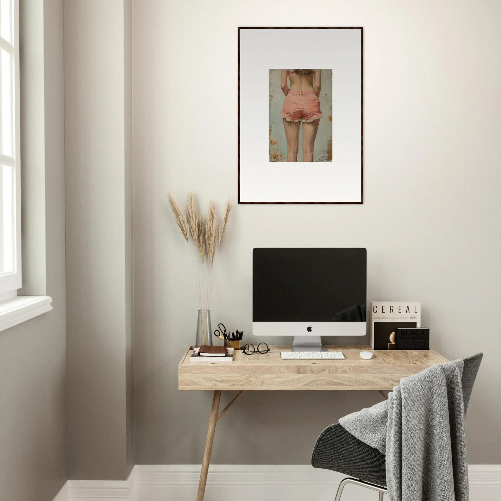 Minimalist home office with wooden desk, computer, and Blossom Elation wall art