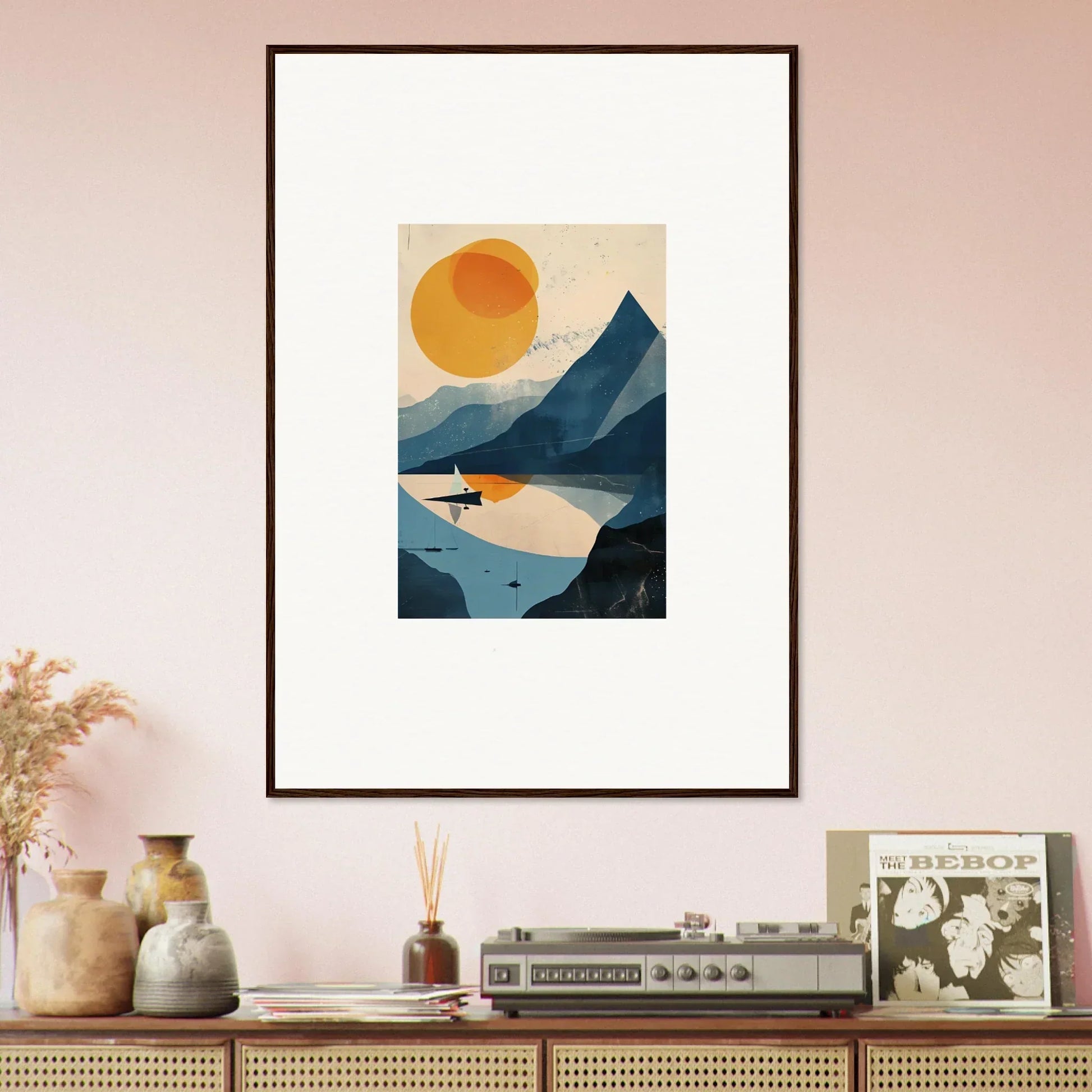 Framed wall art of a sunset over mountains and a lake perfect for room decor