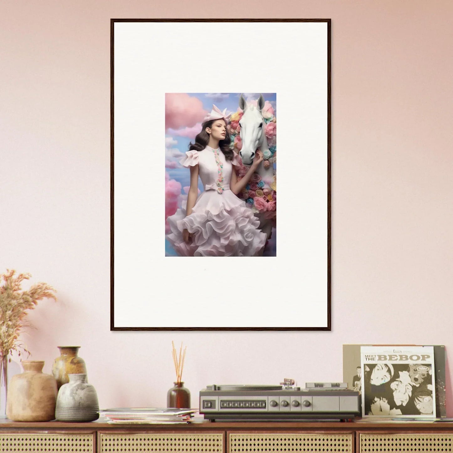 Framed artwork depicting a woman in a white dress with a white horse against a pastel sky.