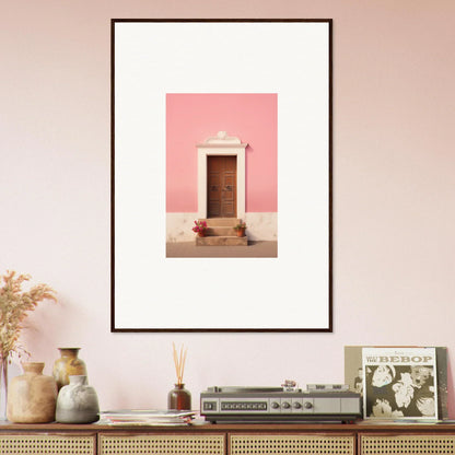 Framed wall art of a wooden door on a pink wall from Pastiche Portal Epiphany