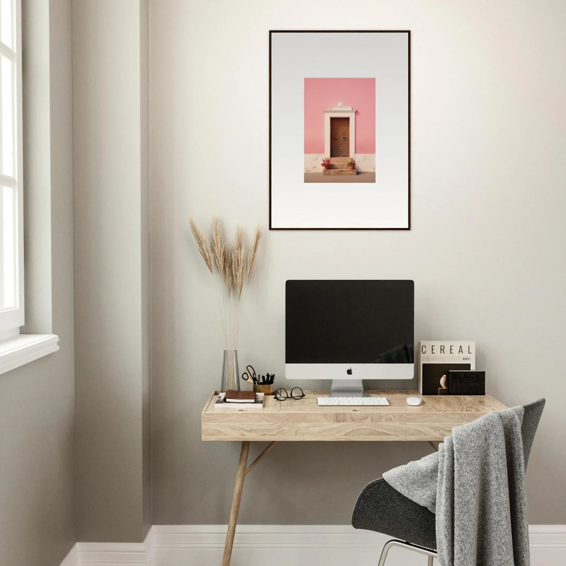 Minimalist wooden desk with iMac and framed wall art from Pastiche Portal Epiphany