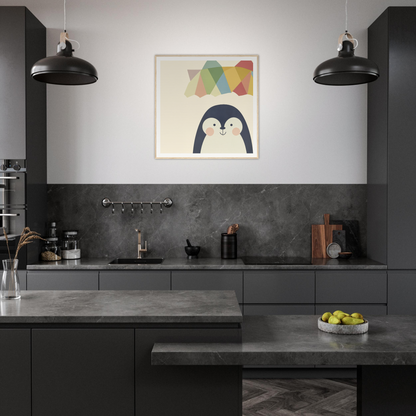 Modern dark gray kitchen featuring Penguin Prismament and stylish black pendant lights