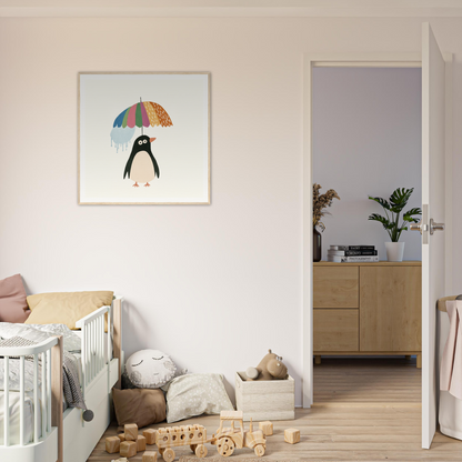 Colorful penguin artwork with a rainbow umbrella for Penguin Umbrella Revel special edition art™