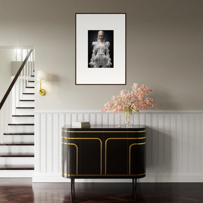 Elegant black and gold console table with curved edges and cabinet doors.