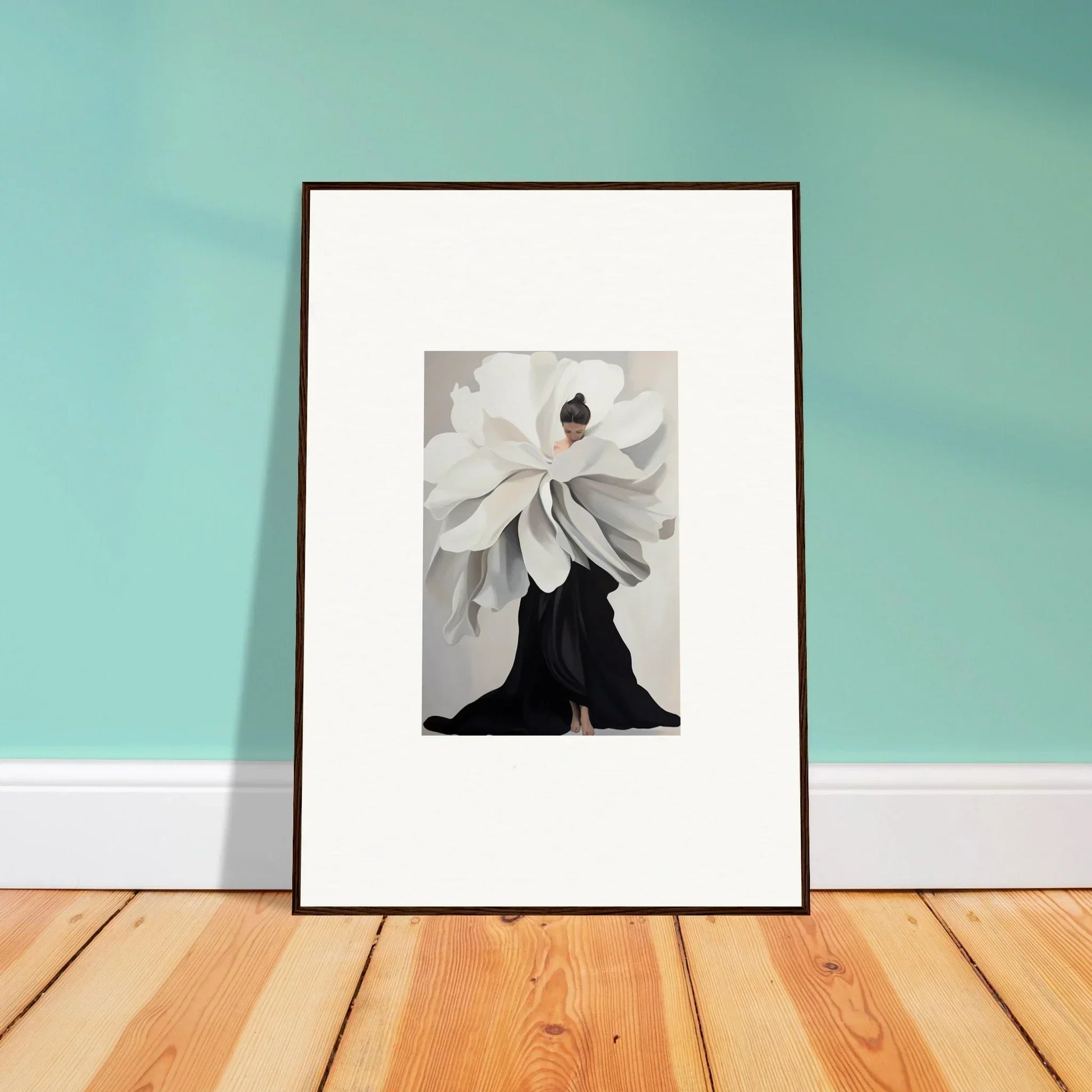 Framed black and white wall art of a figure with a flower head for stylish room decor