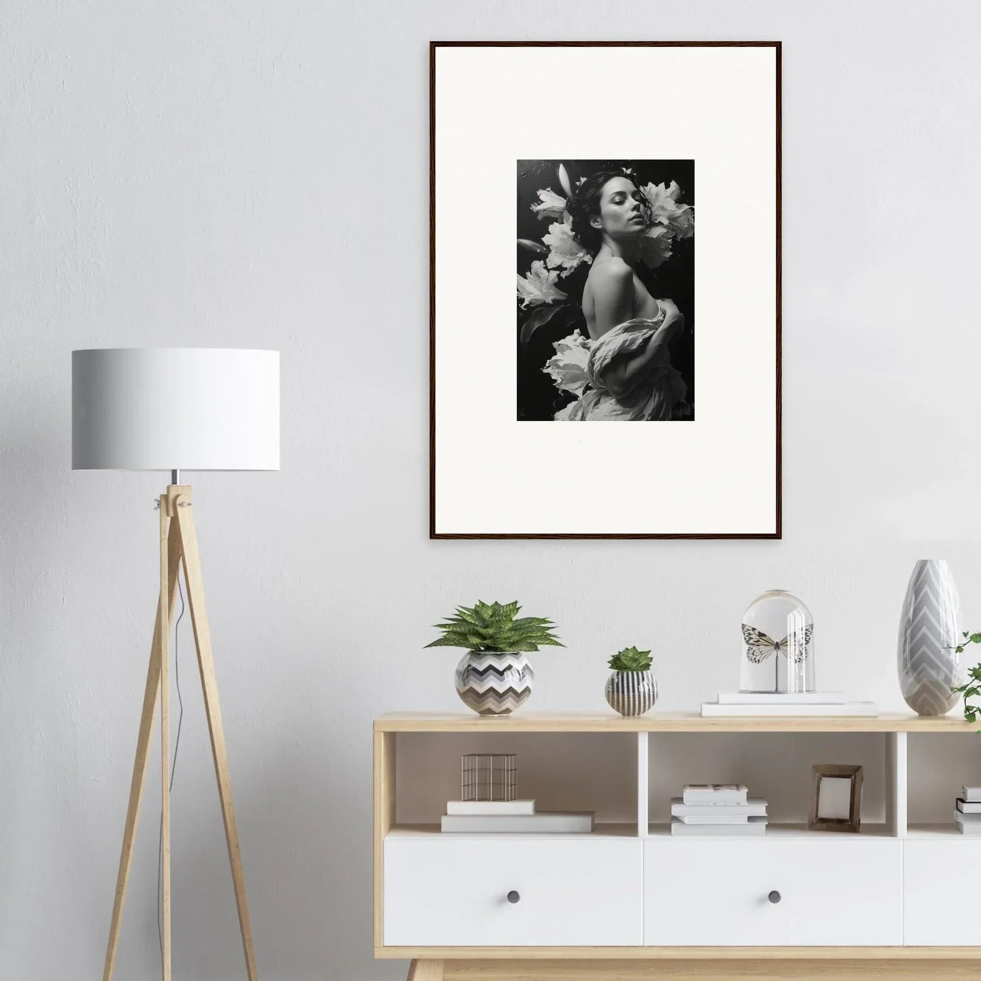 Framed black and white photo of a person holding flowers for chic room decoration