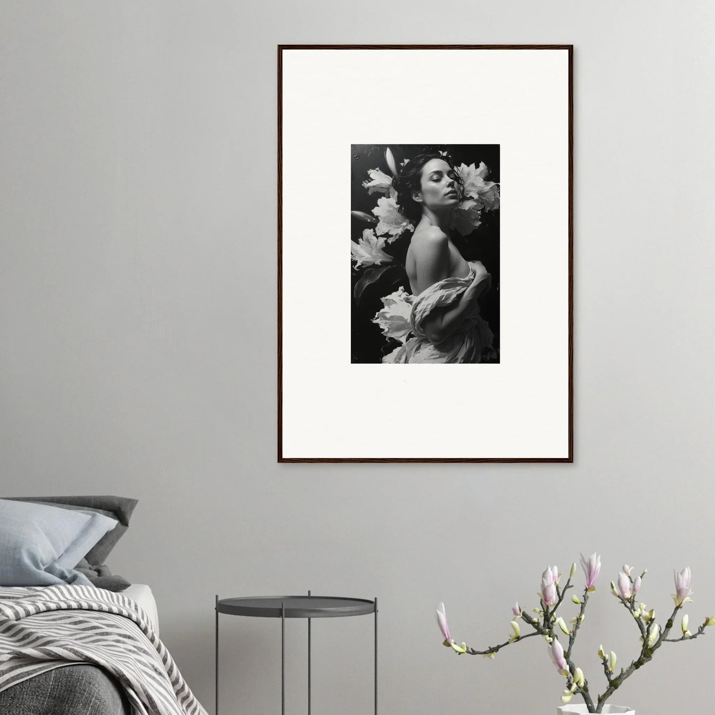 Framed black and white photo of a person with flowers, perfect for room decoration