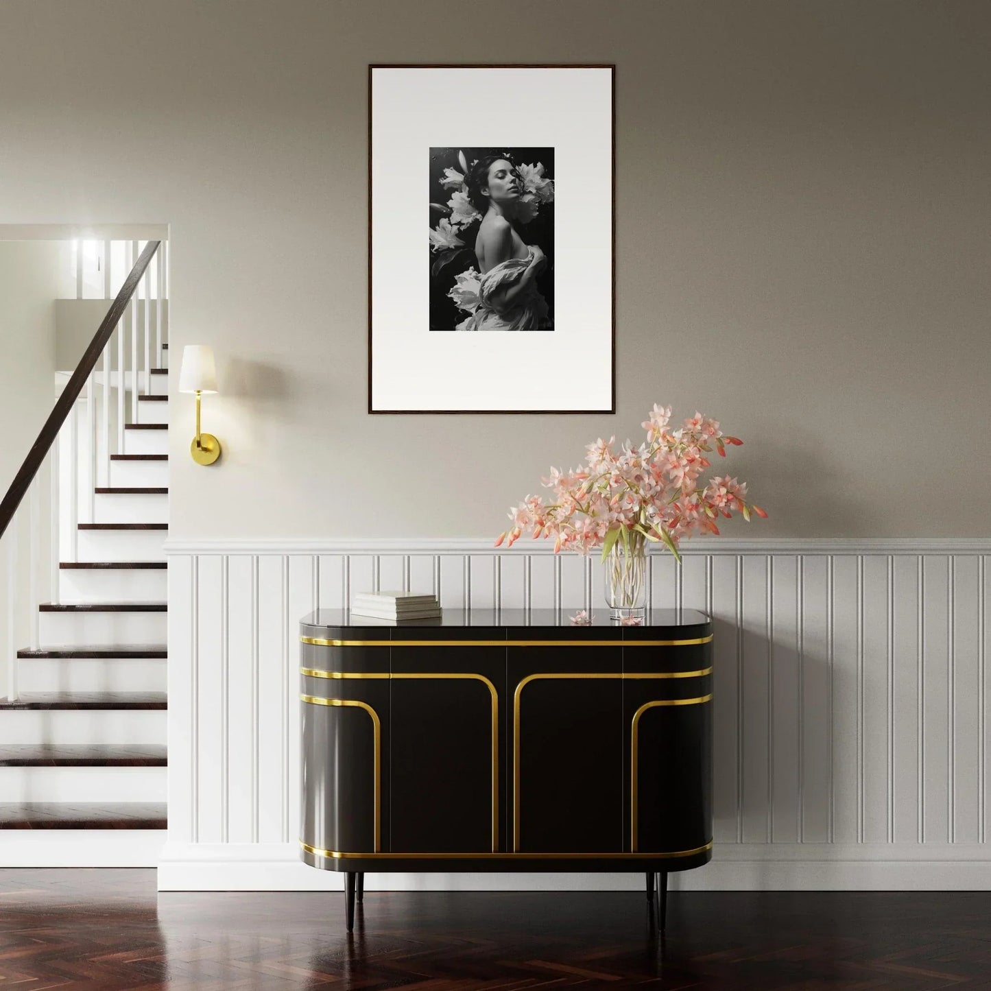 Framed black and white photo above a stylish console table for your Petal Essence Paragon room decoration