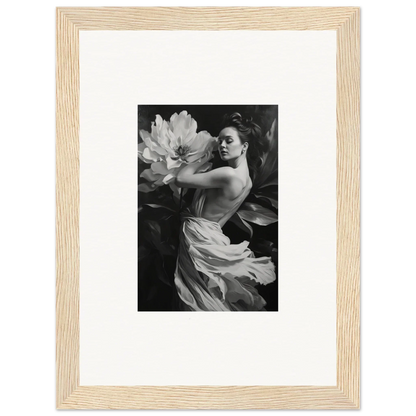 Black and white photo of a woman in fabric with a flower, ideal for framed wall art