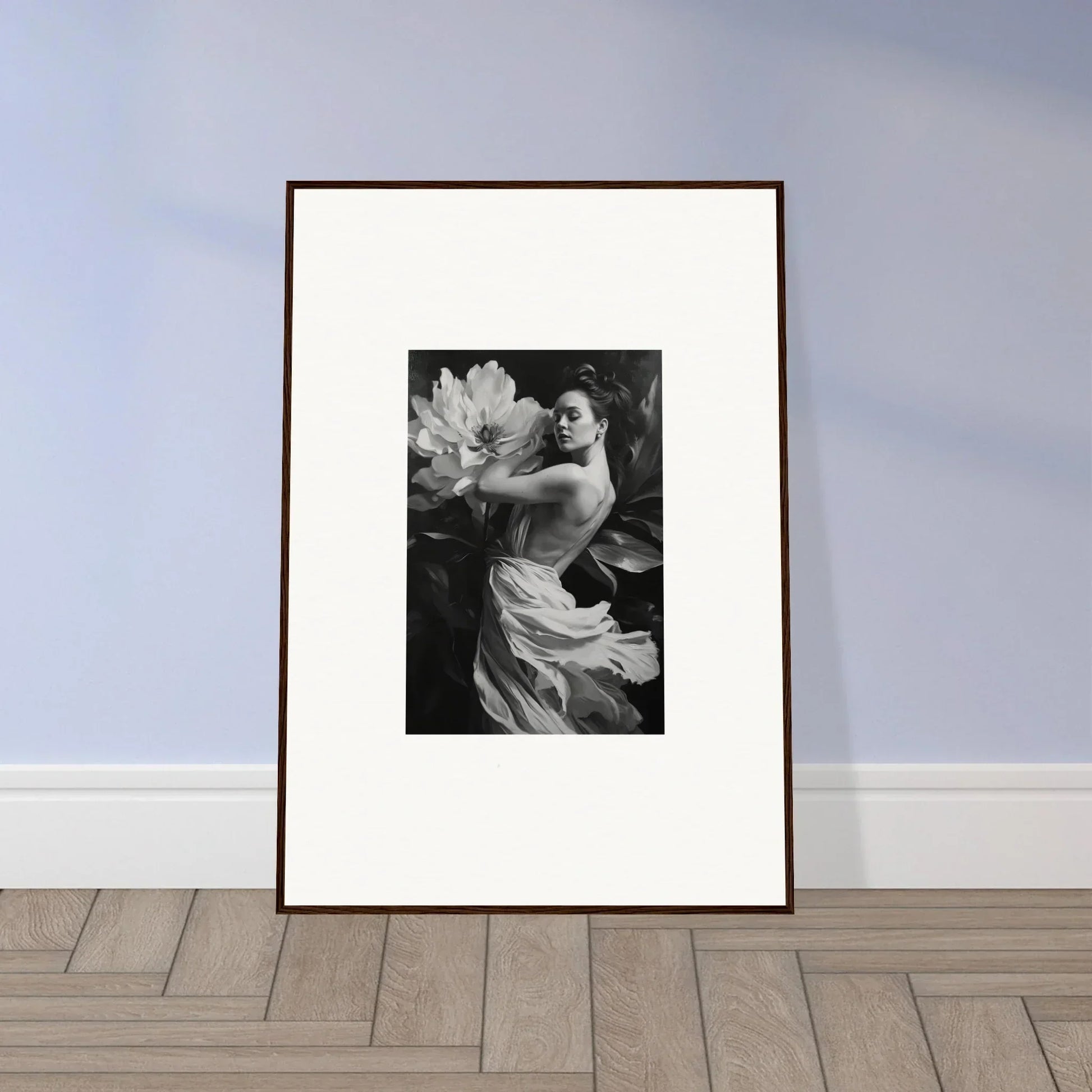 Framed black and white photograph of a woman with a large flower for elegant room decor