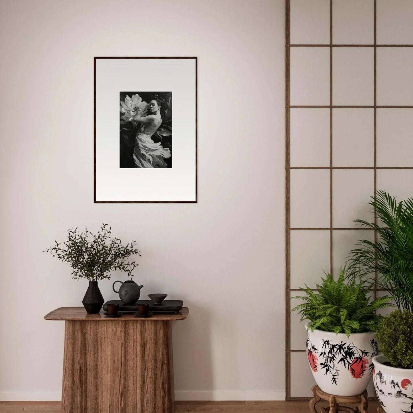 Framed black and white photograph of a person with flowers, perfect for room decor