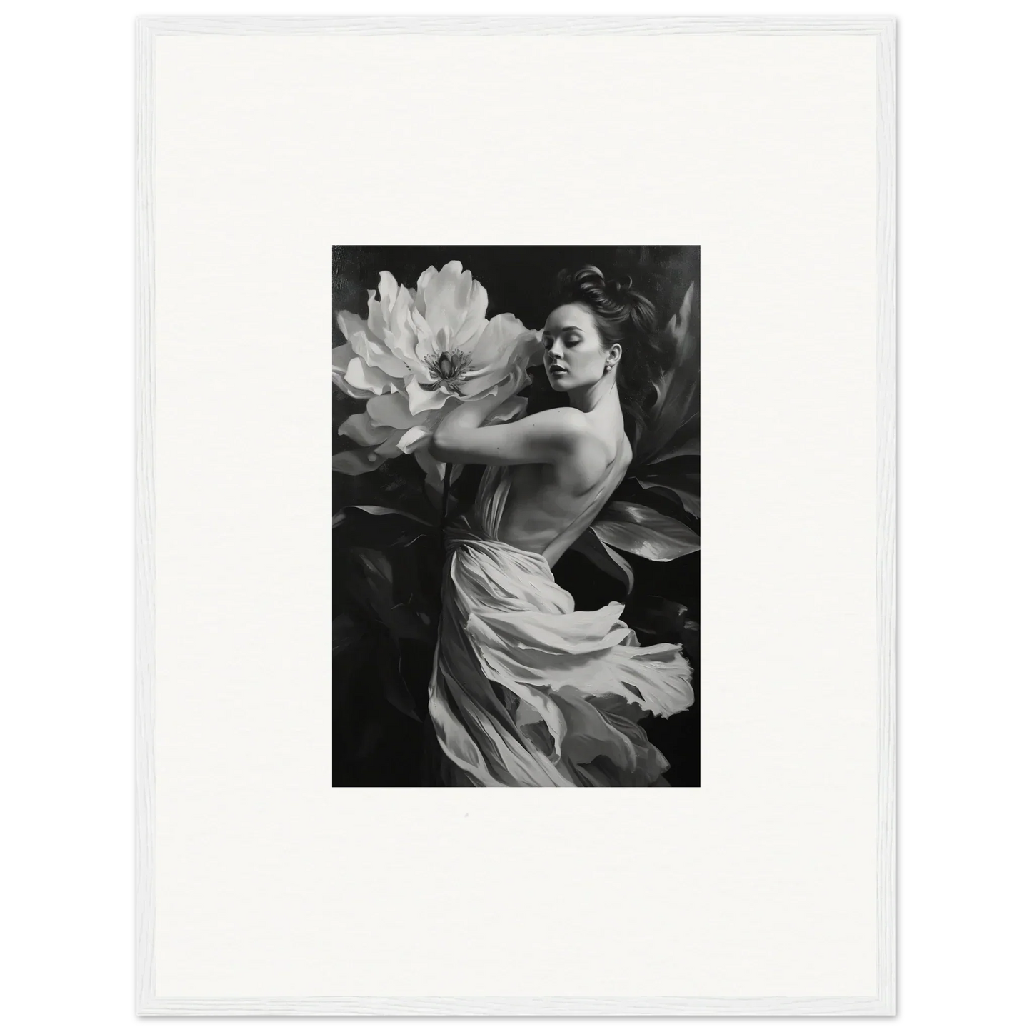 Black and white photo of a woman with flowing fabric and flower for room decor