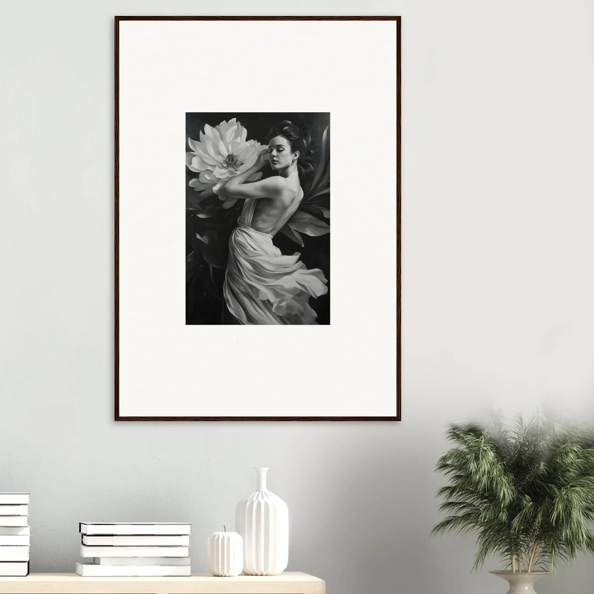 Framed black and white photograph of a woman with a large flower for elegant room decor