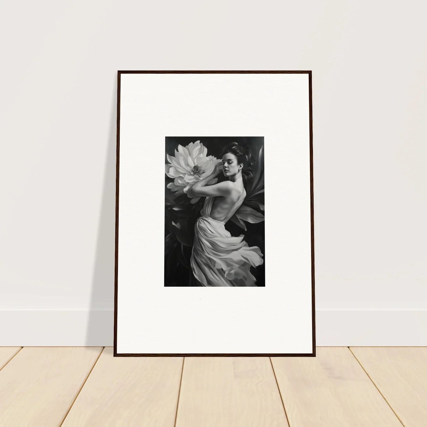 Framed black and white wall art of nude figure with a large flower for elegant room decor