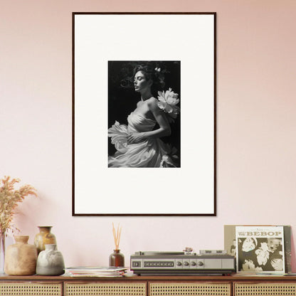 Framed black and white canvas print of woman in elegant dress with flower, perfect for room decoration