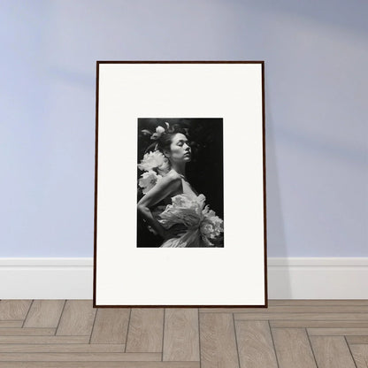 Framed black and white photo of a woman in a feathered garment for Dreaming Nuit room decoration