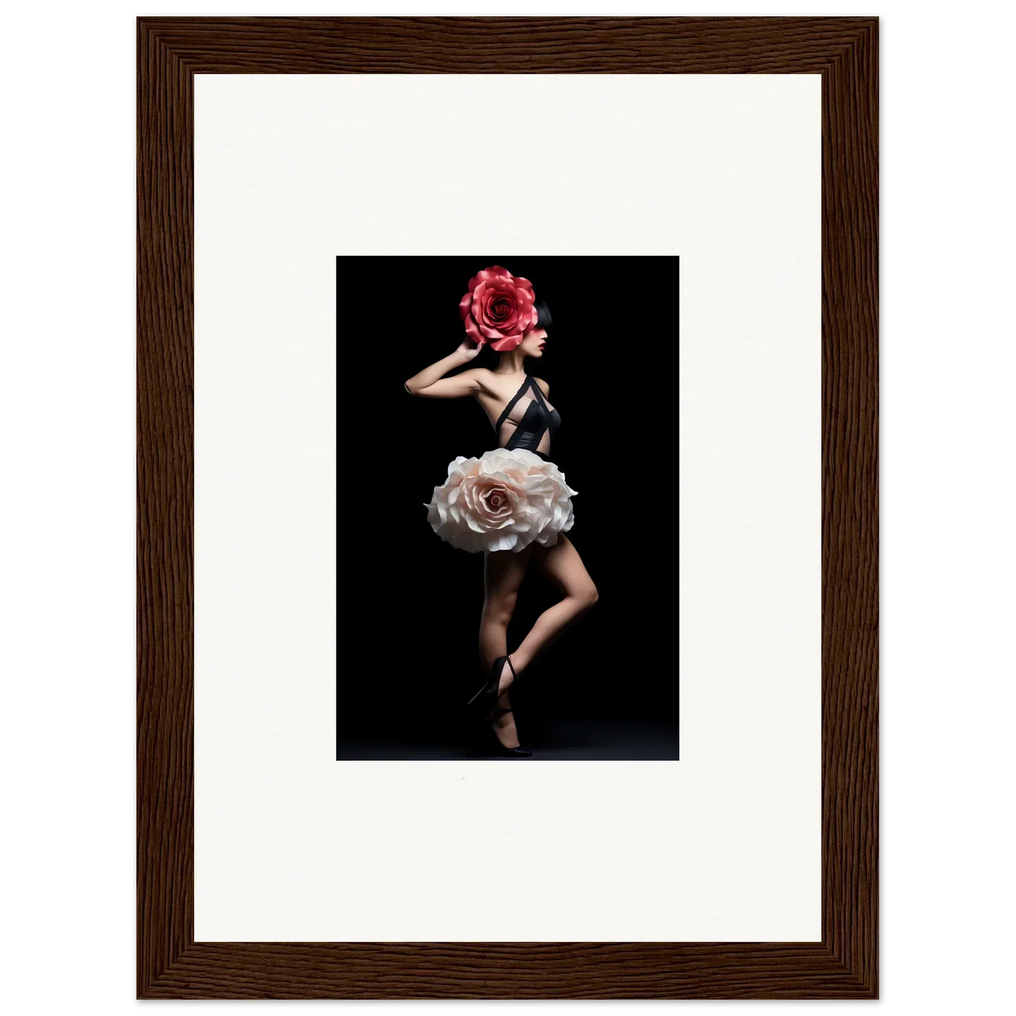 Framed photograph of a dancer wearing a floral-inspired costume.