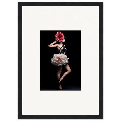 Framed artwork depicting a dancer with a floral-inspired costume against a dark background.