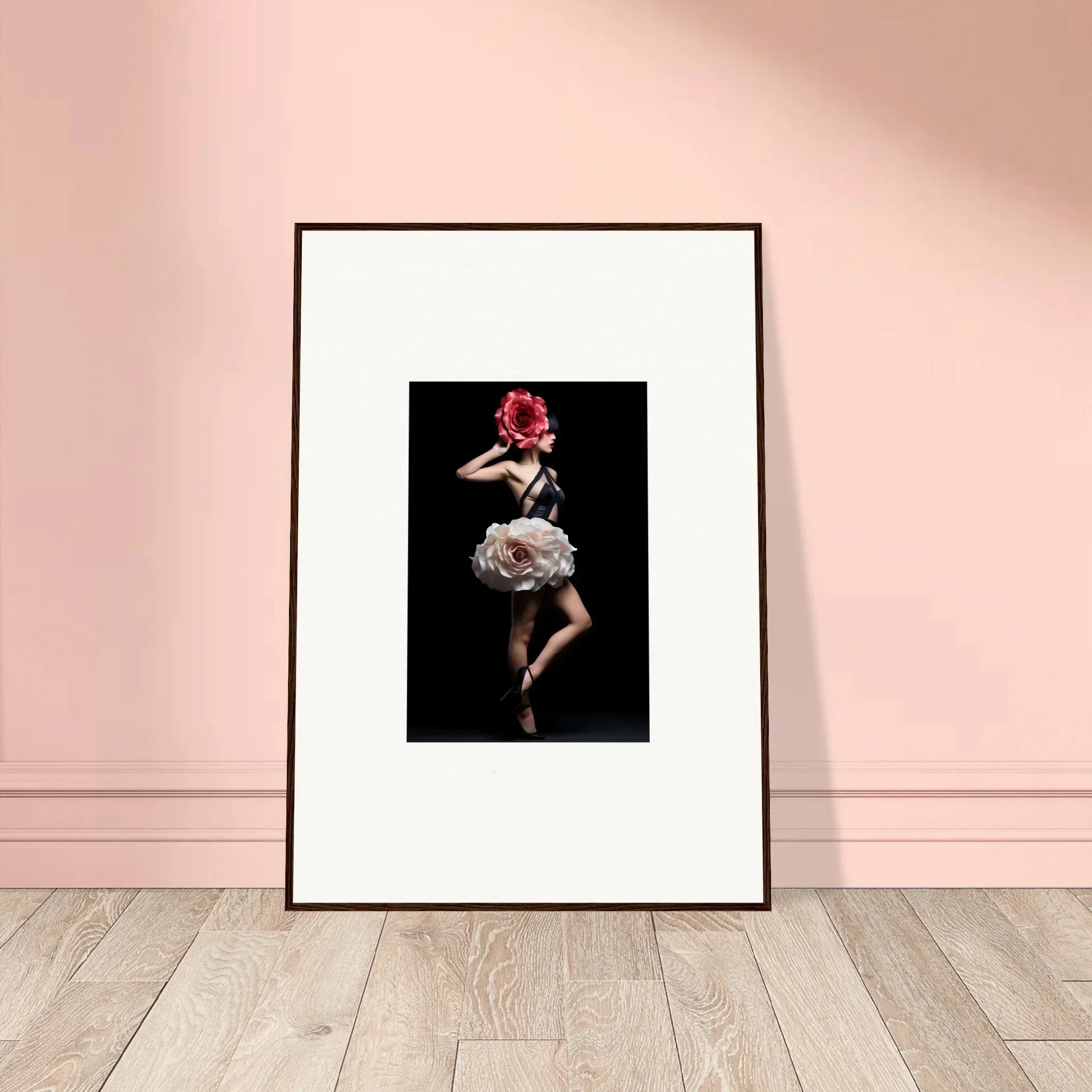 Framed photograph of a dancer in a dramatic pose against a black background.