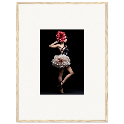 Surreal photograph of a dancer with a giant rose for a skirt and a red flower covering the face.