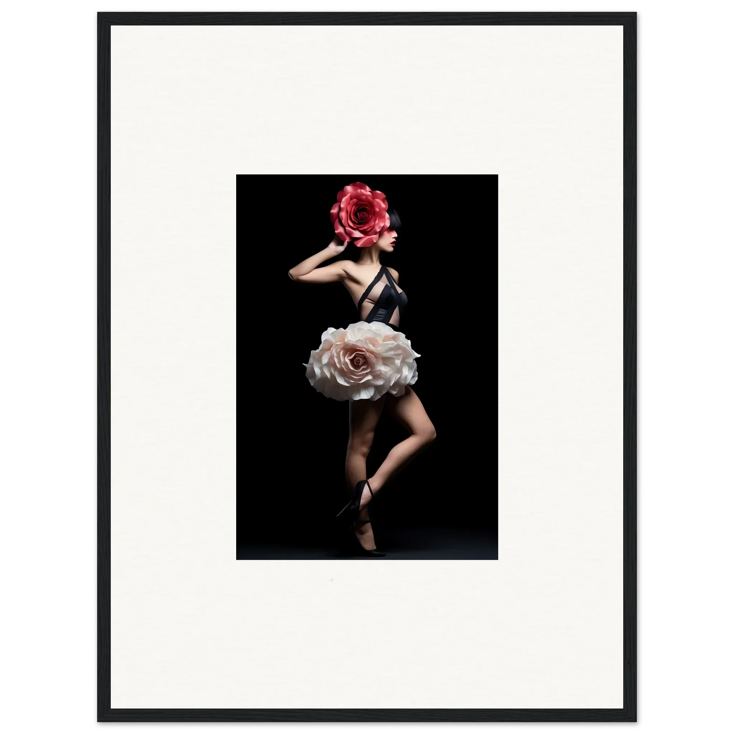 Surreal photograph of a dancer with a giant rose as a skirt and a red flower covering the face.