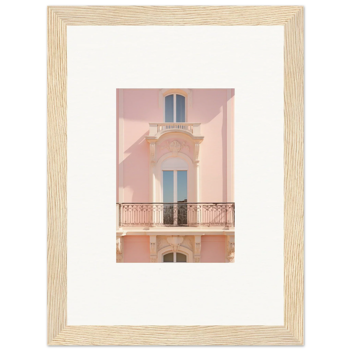 Pink building facade with ornate balcony and blue windows, perfect for Pink Echoed Dream