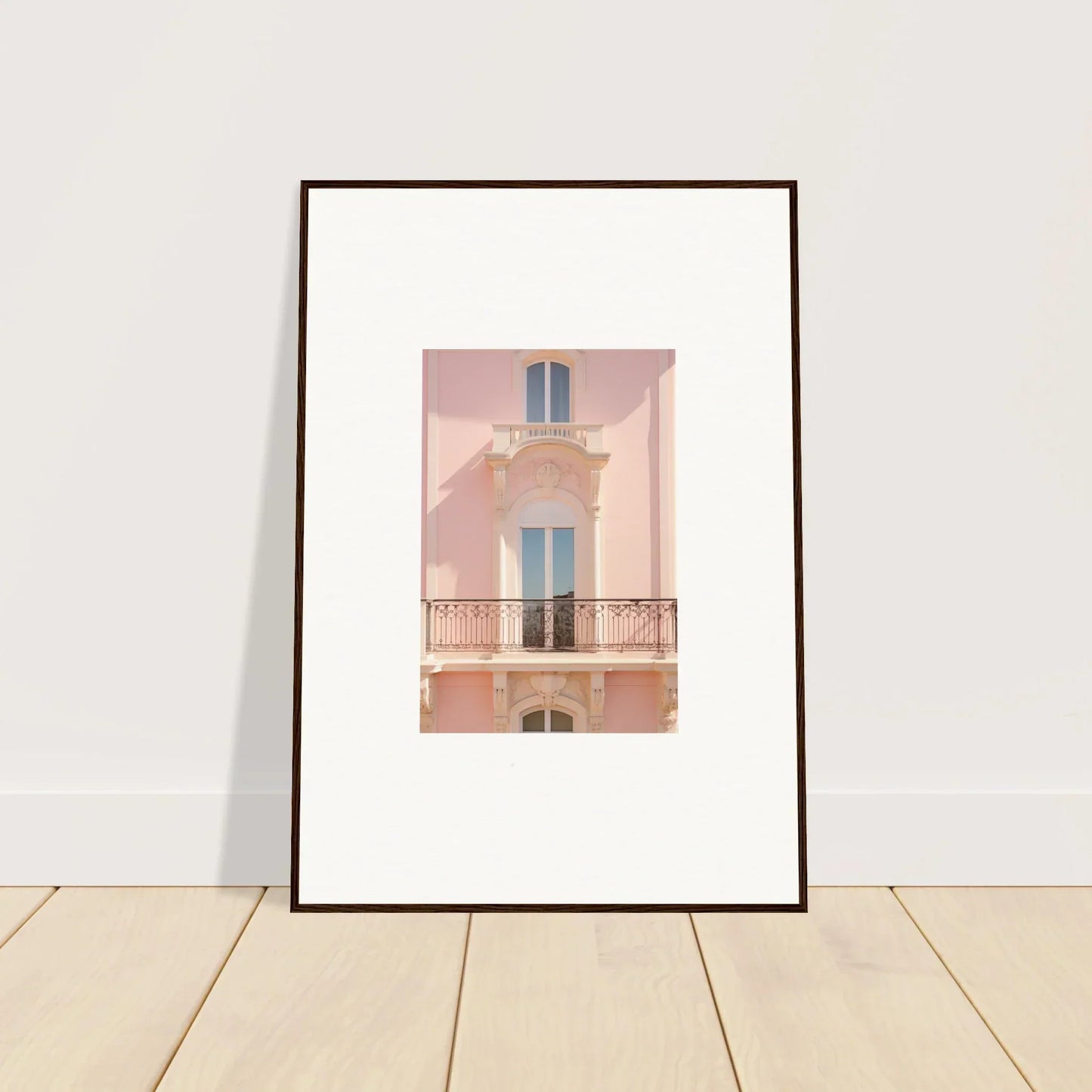 Framed wall art of a pink Mediterranean facade from the Pink Echoed Dream collection