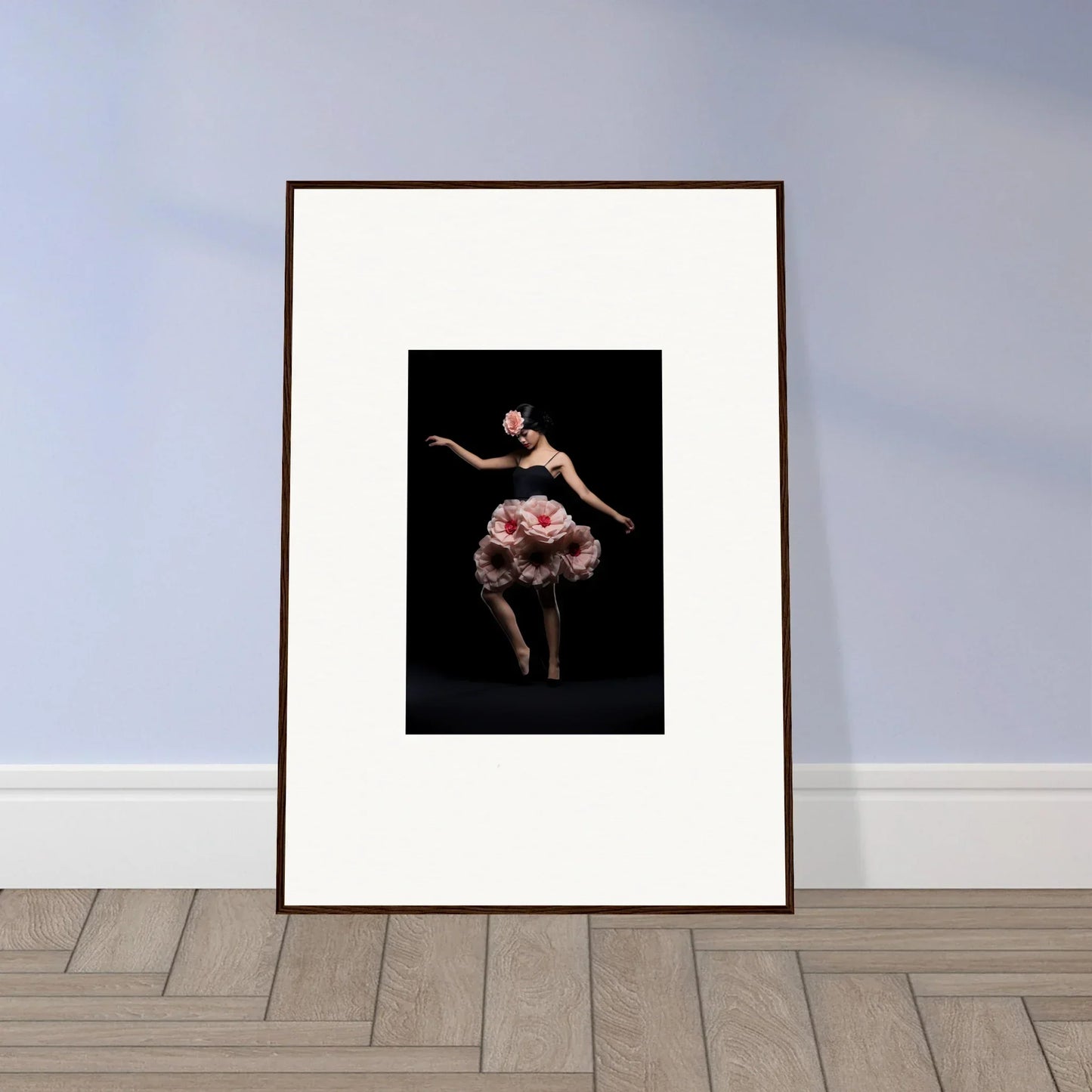 Framed wall art of a ballet dancer in a pink tutu for elegant room decor with floral feels