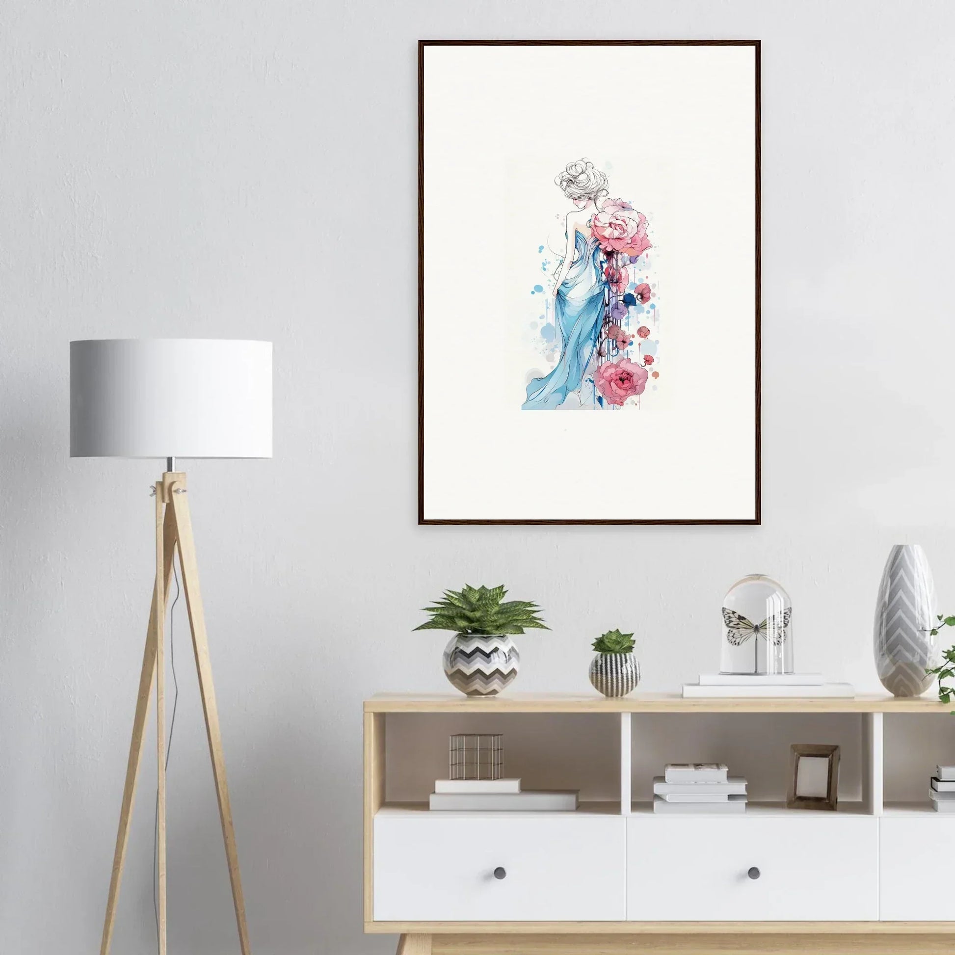 Framed watercolor of a figure in blue with pink flowers for your pollen waltz room decoration