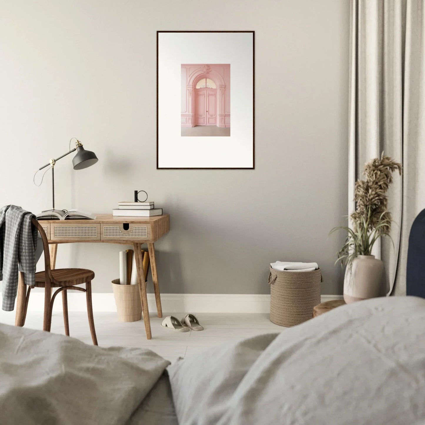 Wooden desk with gray lamp and Pompadour Cogswheel Echoes framed wall art above