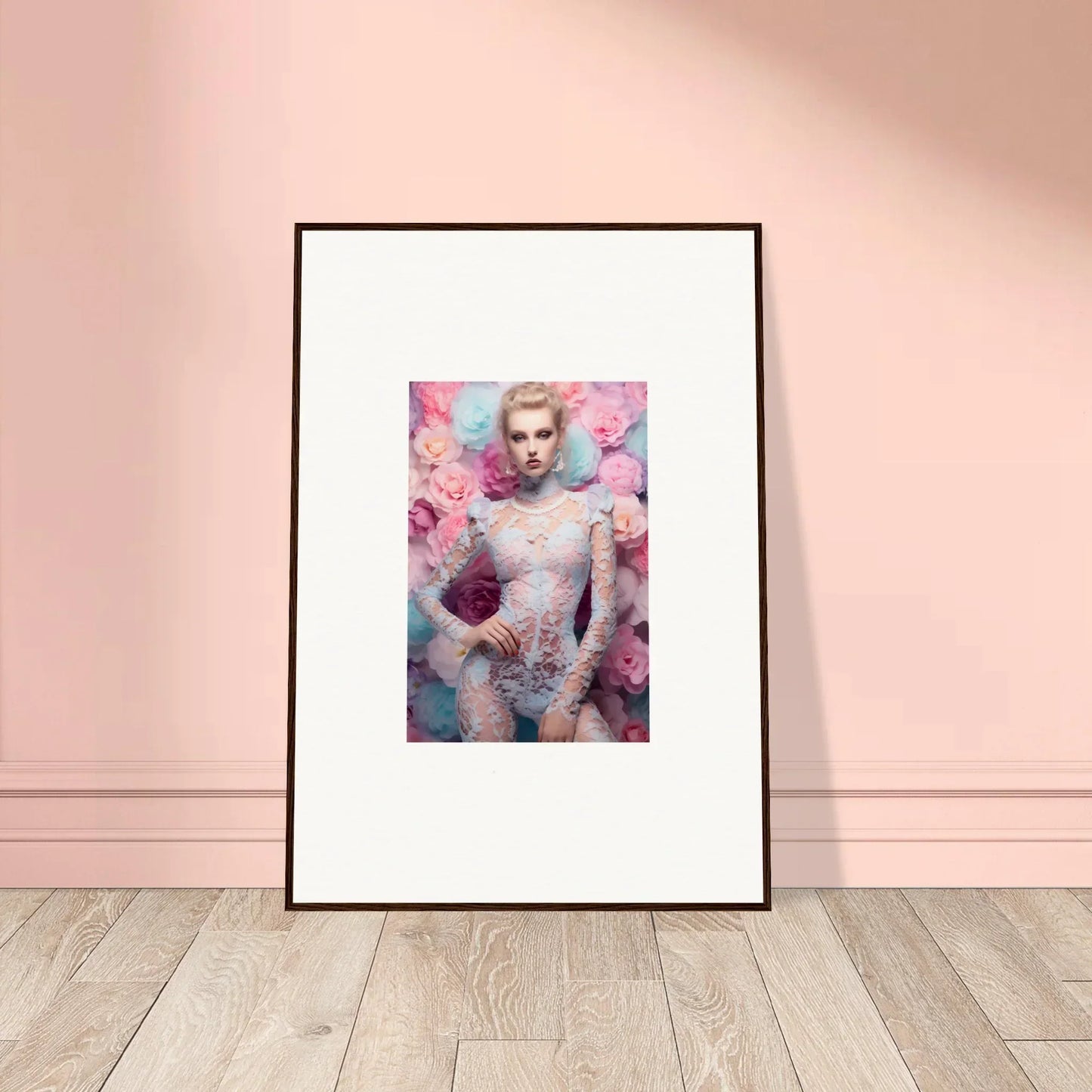 Framed portrait photograph of a person surrounded by pink flowers and pastel colors.